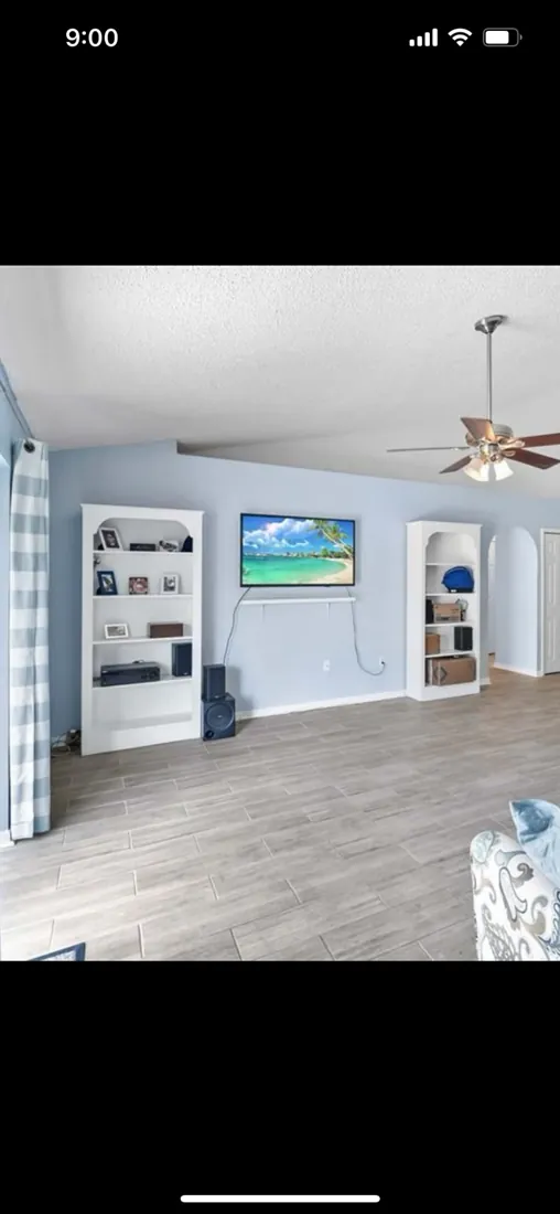 Wall-mounted television in a residential living room