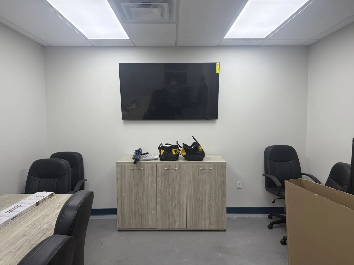Meeting table, seating and glass writing board