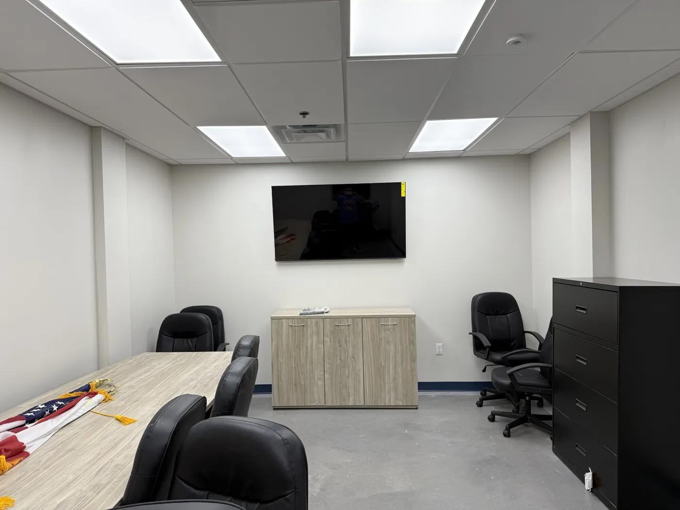 Conference furnishings and mounted display