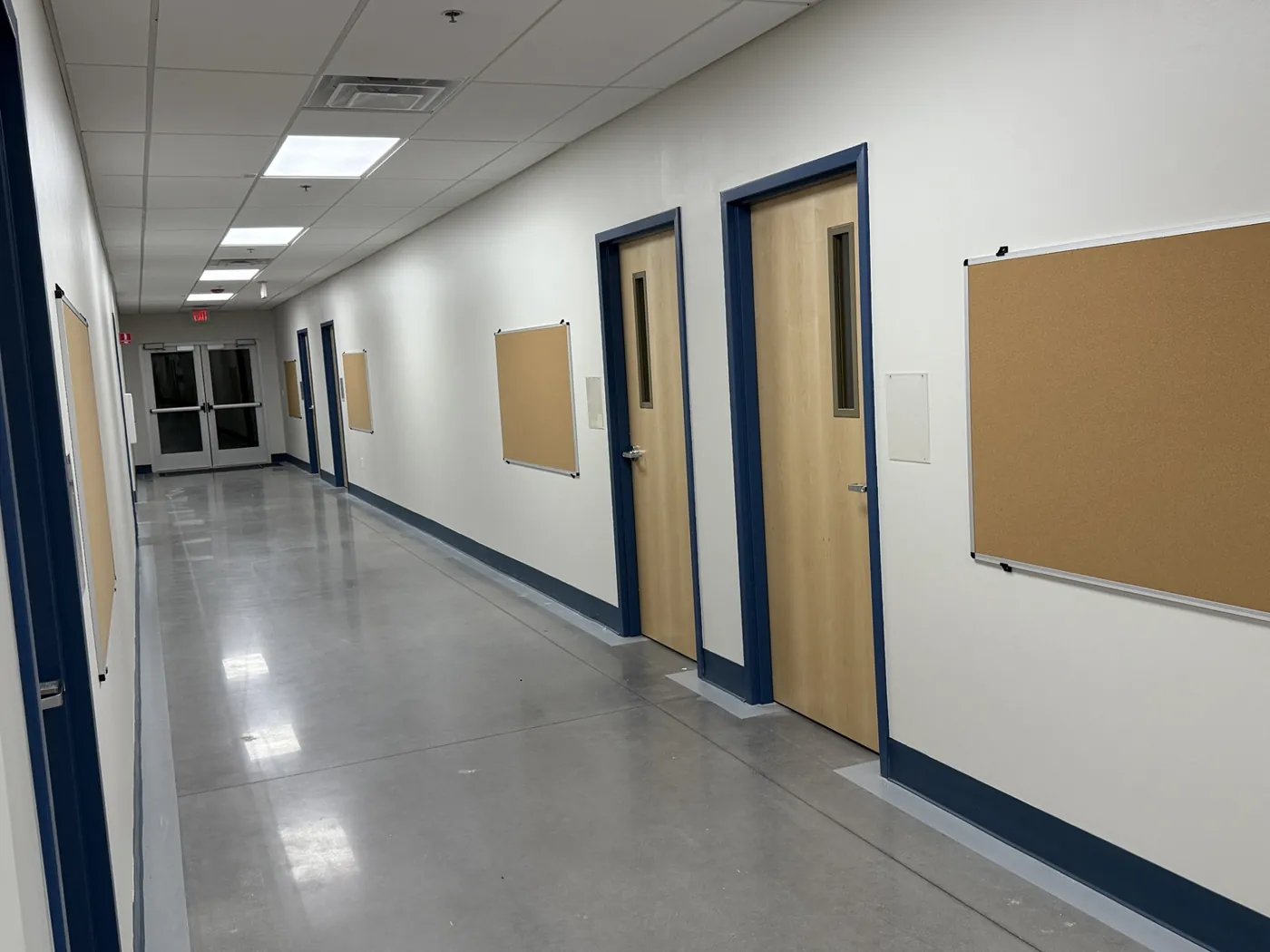 Multiple wall-mounted tack boards